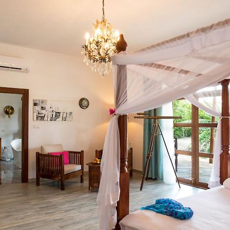 Tikitam Palms Boutique Hotel Pongwe Extérieur photo
