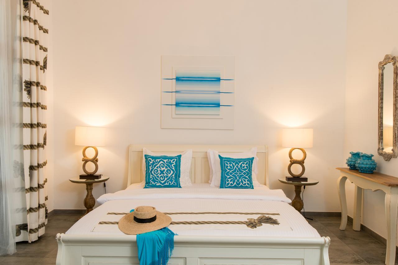 Tikitam Palms Boutique Hotel Pongwe Extérieur photo