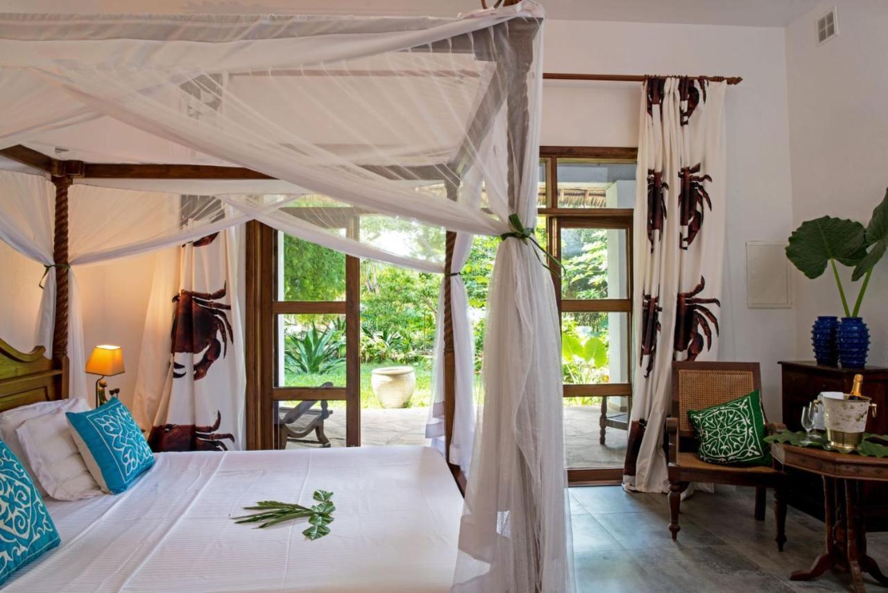 Tikitam Palms Boutique Hotel Pongwe Chambre photo
